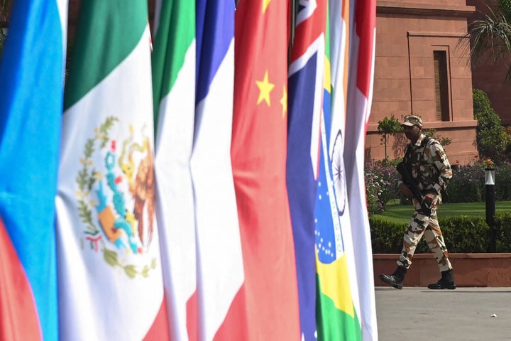 An armed soldier stands guard during the G20 foreign ministers' meeting in New Delhi on March 2, 2023. (Photo by Arun SANKAR / AFP) (Photo by ARUN SANKAR/AFP via Getty Images)