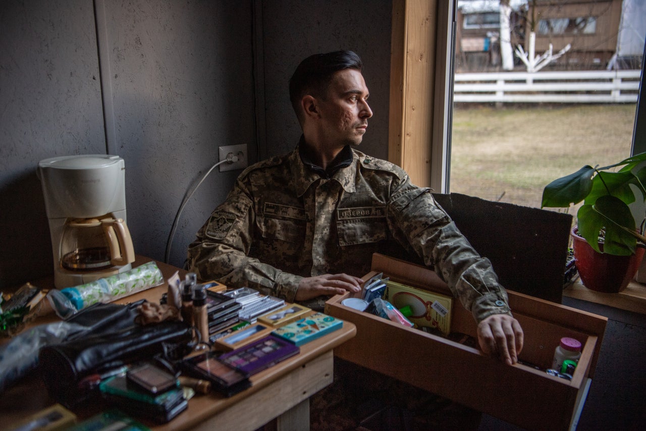 Ozerov shows his makeup kit. 