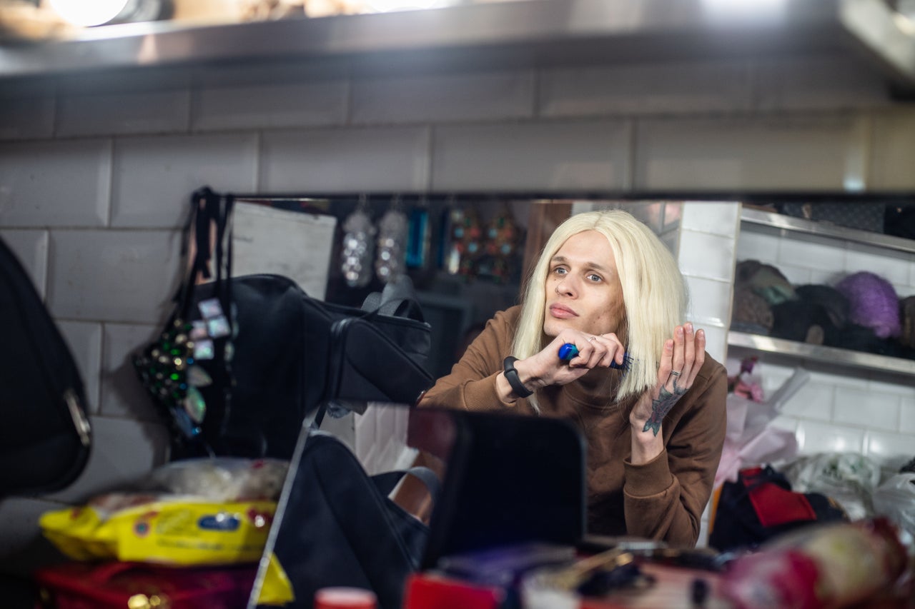 Drag queen Adele gets ready in the dressing room before performing at G-Versace Club.