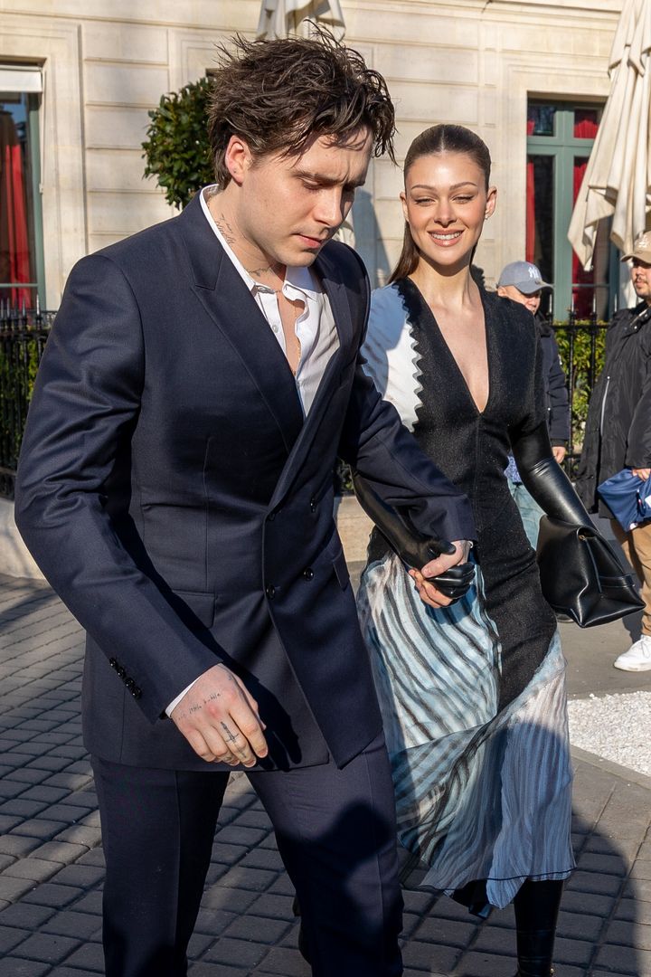 (L-R) Brooklyn Beckham and Nicola Peltz are seen on March 03, 2023 in Paris, France. (Photo by Marc Piasecki/GC Images)