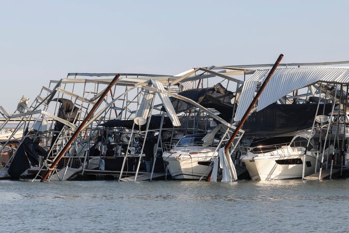 Docks and boats are damaged at Lake Lewisville marina in Lewisville, Texas, Friday, March, 3, 2023, after a severe storm moved through the area the night before.