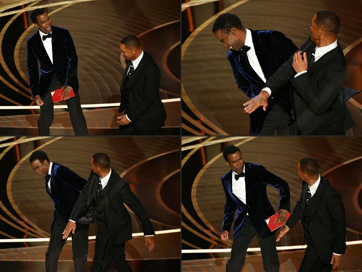 Will Smith (R) slaps US actor Chris Rock onstage during the 94th Oscars at the Dolby Theatre in Hollywood, California on March 27, 2022. (Photo by Robyn Beck / AFP) (Photo by ROBYN BECK/AFP via Getty Images)