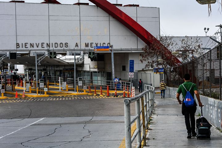 People cross into Matamoros, Mexico, from Brownsville, Texas, at the Gateway International Bridge on March 15, 2021. The FBI on Sunday said four U.S. citizens were taken at gunpoint shortly after crossing the border into Mexico.