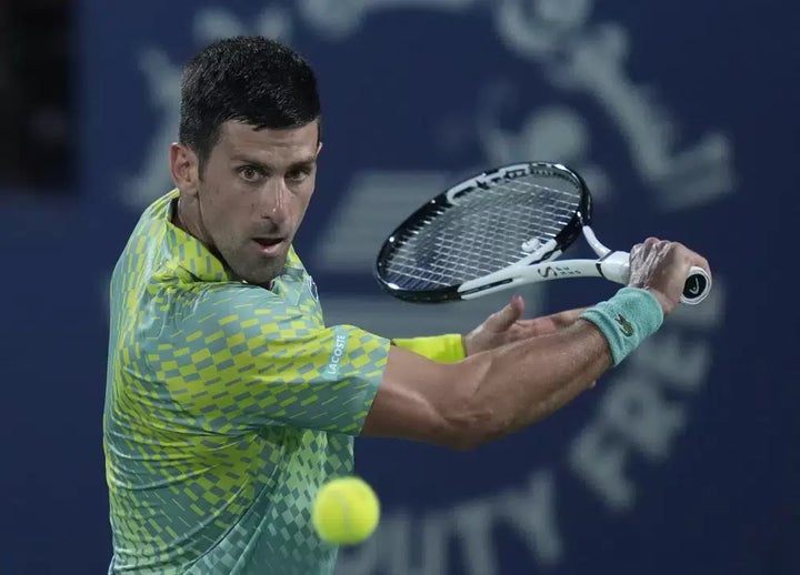 Serbia's Novak Djokovic returns the ball to Daniil Medvedev during their semi final match of the Dubai Duty Free Tennis Championships in Dubai on March 2.