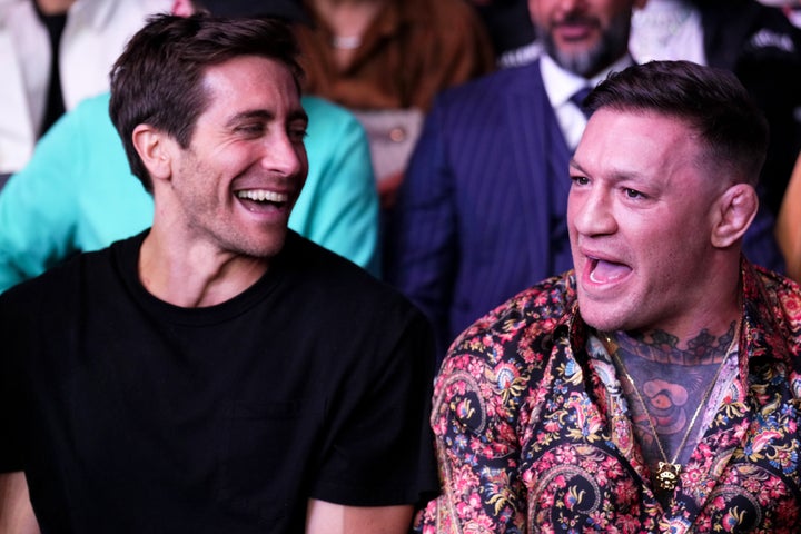 "Road House" co-stars Jake Gyllenhaal and Conor McGregor enjoy a light moment during the UFC 285 event at T-Mobile Arena on Saturday.