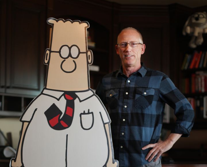 Scott Adams, cartoonist and author and creator of "Dilbert," with a cutout of his Dilbert character in 2014.