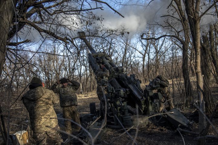 Ukrainian servicemen fire an artillery cannon aiming to Russian positions in the frontline nearby Bakhmut in Donbas, Ukraine, March 5th, 2023.