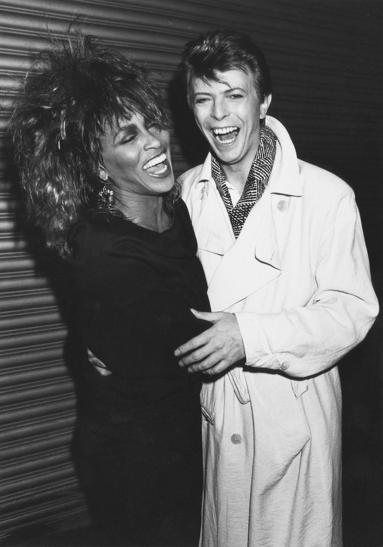 Turner with English singer-songwriter David Bowie in 1985.