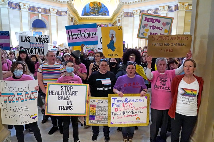 Trans rights activists protest outside the House chamber at the Oklahoma state Capitol before the State of the State address, Feb. 6, 2023, in Oklahoma City. State Rep. Mauree Turner, a Black nonbinary Democratic state legislator in the Oklahoma House, was formally censured by the Republican majority on Tuesday, March 7, for allegedly refusing to let state troopers question a transgender rights activist who was inside their legislative office.