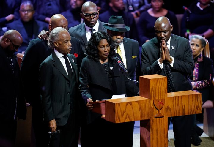 MEMPHIS, TN - FEBRUARY 01: Flanked by Rev. Al Sharpton and her husband Rodney Wells, RowVaughn Wells speaks during the funeral service for her son Tyre Nichols at Mississippi Boulevard Christian Church on February 1, 2023 in Memphis, Tennessee.