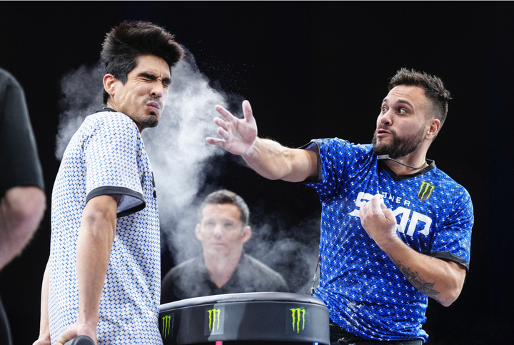 Azael Rodriguez slaps Jesus Gaspar at a Power Slap event in Rio De Janiero, Brazil, Nov. 30, 2022. The competitors stand rigidly upright with their hands behind their backs, waiting to absorb a brutal slap to the face.