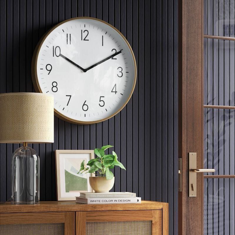 A perennially stylish brass wall clock