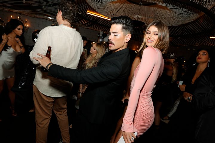 Tom Sandoval, left, and Raquel Leviss, right, seen at a party in 2021.