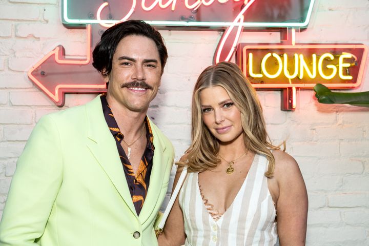Tom Sandoval, left, and Ariana Madix, right, seen at a restaurant opening in 2022.