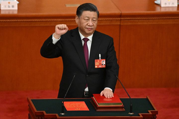 China's President Xi Jinping swears under oath after being re-elected as president for a third term during the third plenary session of the National People's Congress (NPC) at the Great Hall of the People in Beijing on March 10, 2023. (Photo by NOEL CELIS / AFP) (Photo by NOEL CELIS/AFP via Getty Images)
