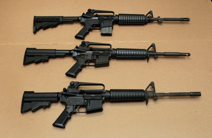 Three variations of the AR-15 assault rifle are displayed at the California Department of Justice in Sacramento, California.