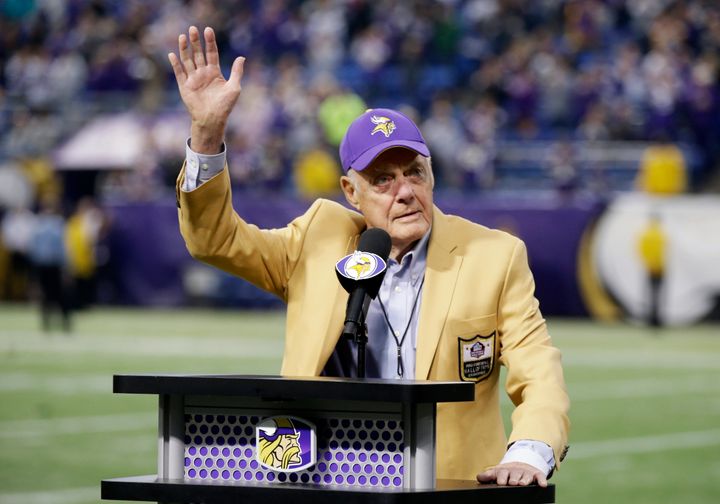 Former Minnesota Vikings Hall of Fame coach Bud Grant waves a final goodbye to the Metrodome during ceremonies following the Vikings NFL football against the Detroit Lions, Sunday, Dec. 29, 2013, in Minneapolis. Grant, the stoic and demanding Hall of Fame coach who took the Minnesota Vikings and their mighty Purple People Eaters defense to four Super Bowls in eight years and lost all of them, has died. He was 95. (AP Photo/Jim Mone, File