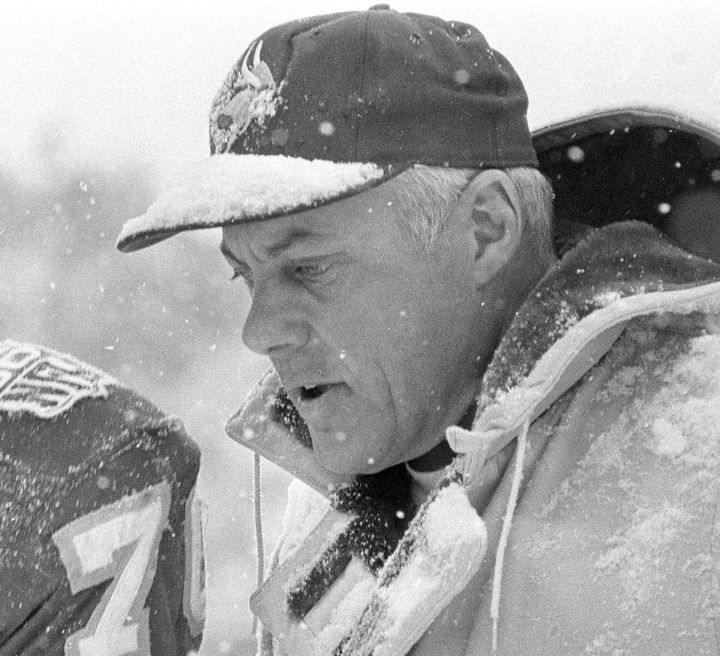FILE - Sporting a snow-covered cap, Minnesota Vikings head coach Bud Grant leaves the field, Dec. 14, 1969 , following with the Vikings' latest NFL win, a 10-7 victory over the San Francisco 49ers in Bloomington, Minn. Grant, the stoic and demanding Hall of Fame coach who took the Minnesota Vikings and their mighty Purple People Eaters defense to four Super Bowls in eight years and lost all of them, has died. He was 95. (AP Photo/Robert Walsh, File)