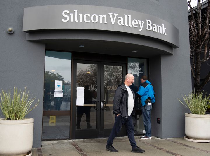 SANTA CLARA, CALIFORNIA - MARCH 10: A man walks by the headquarters of Silicon Valley Bank on March 10, 2023 in Santa Clara, California. (Photo by Liu Guanguan/China News Service/VCG via Getty Images)