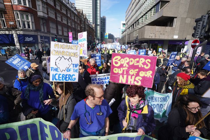 People gather on Warren Street in London, ahead of a Support the Strikes march in solidarity with nurses, junior doctors and other NHS staff following recent strikes over pay and conditions. Picture date: Saturday March 11, 2023.