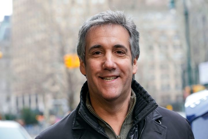 Michael Cohen smiles as he leaves a lower Manhattan building after meeting with prosecutors, on March 10, 2023, in New York.