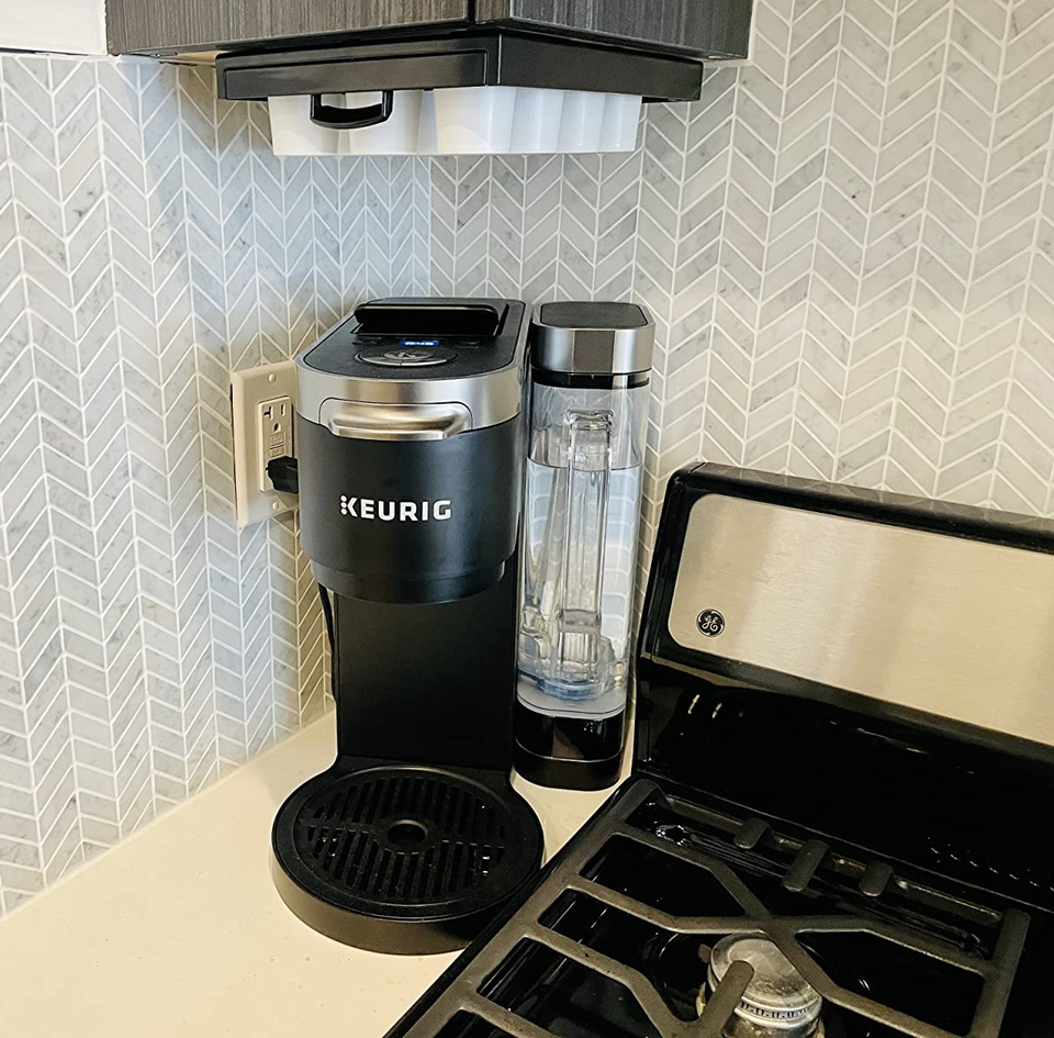 A well-disguised coffee pod tray