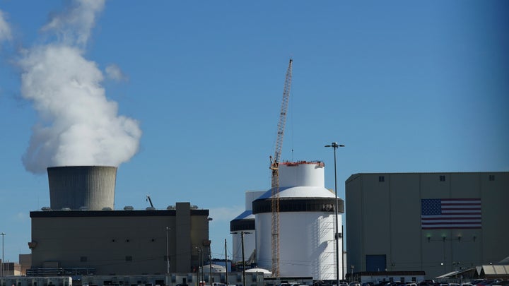 Reactor No. 3 and it's cooling tower stand at Georgia Power Co.'s Vogtle site in Waynesboro. The nuclear plant has begun splitting atoms in one of its two new reactors, Georgia Power Co. said March 6, a key step toward reaching commercial operation at the first new nuclear reactors built from scratch in decades in the United States.