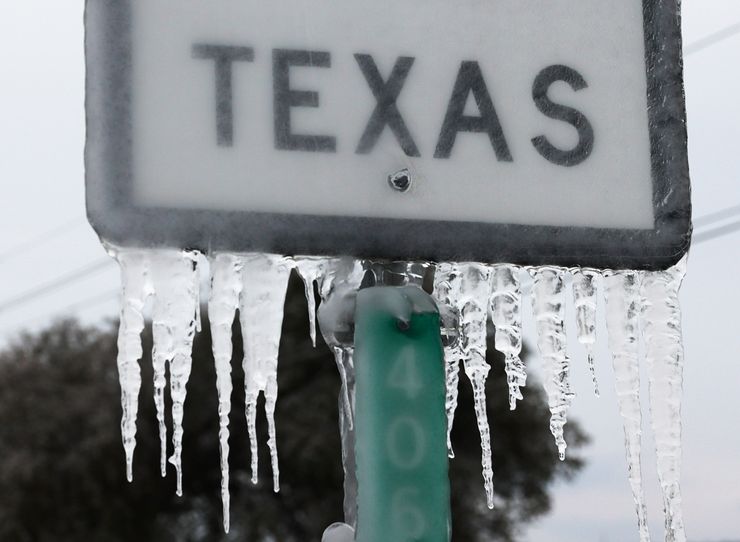 Icicles hang off the State Highway 195 sign on Feb. 18, 2021, in Killeen, Texas, during Winter Storm Uri.