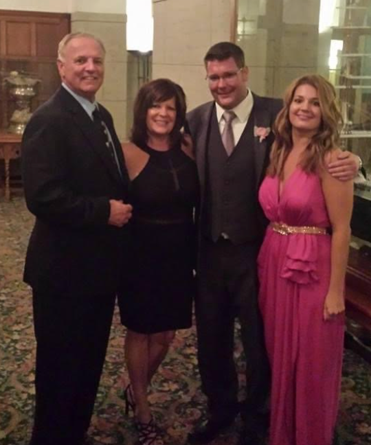 The author (right) with her family at a wedding four months after her father’s colon cancer diagnosis.