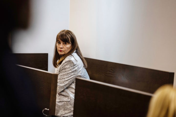 Justyna Wydrzyńska sits at the court in Warsaw, Poland, on Tuesday, March 14, 2023. A court on Tuesday convicted her for helping a victim of domestic violence access abortion pills in Poland and sentenced her to eight months of community service.