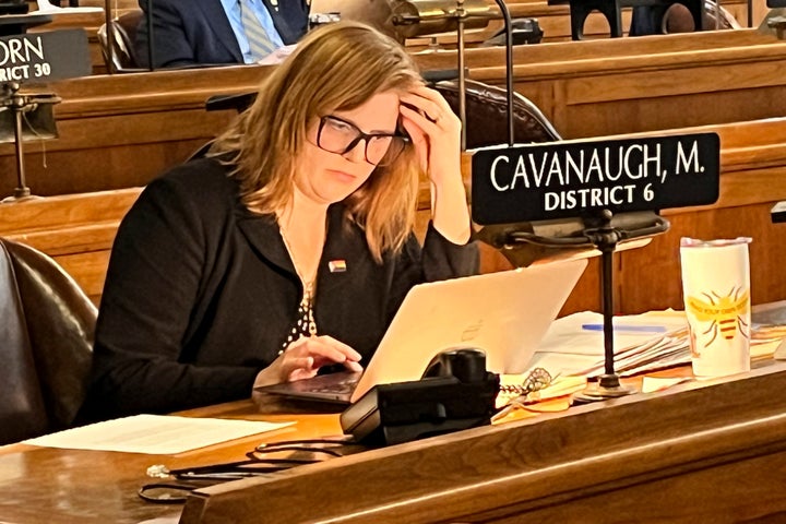 State Sen. Machaela Cavanaugh prepares to speak before the Nebraska Legislature Monday, March 13, 2023, at the Nebraska State Capital in Lincoln, Neb. Cavanaugh is in her third week of an effort to filibuster every bill that comes before the Legislature this session — even the ones she supports. The effort is a protest against conservatives' advancement of a bill that would outlaw gender-affirming therapies for those 18 and younger. Cavanaugh has declared she will "burn the session to the ground" in an effort to stymie the bill.