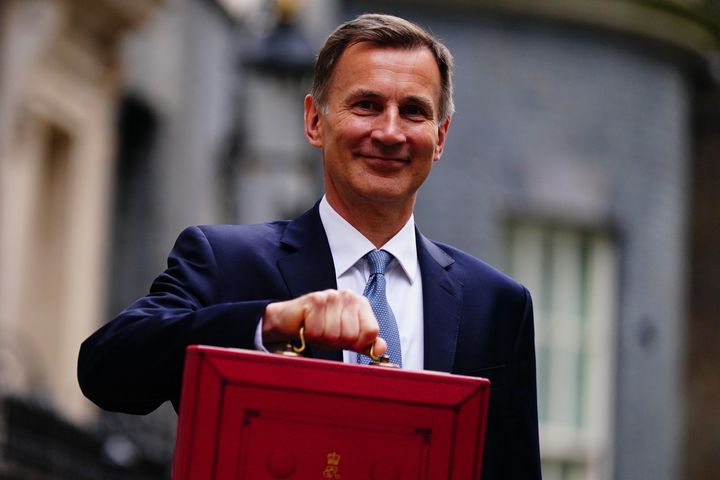 Jeremy Hunt leaves 11 Downing Street before delivering his Budget.