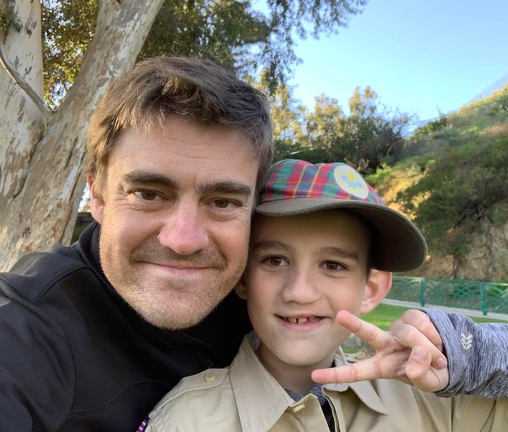 The author and his son at a Cub Scouts ceremony.
