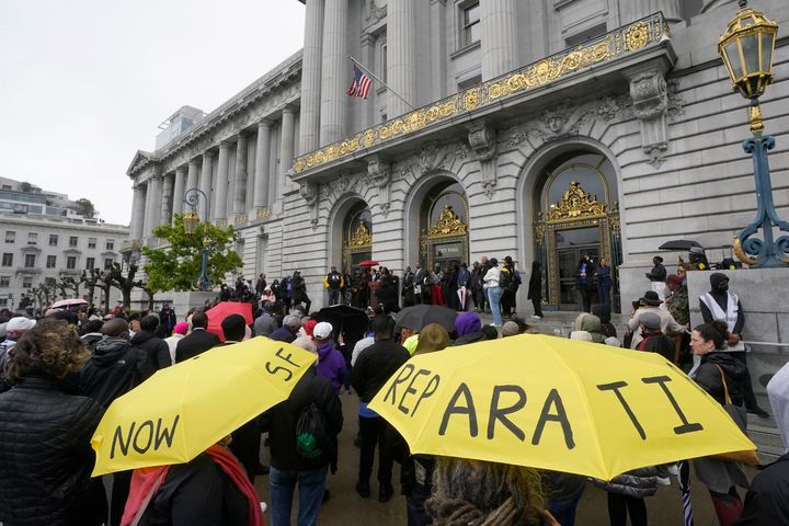 A crowd listens to speakers at a reparations rally outside of City Hall in San Francisco on Tuesday.