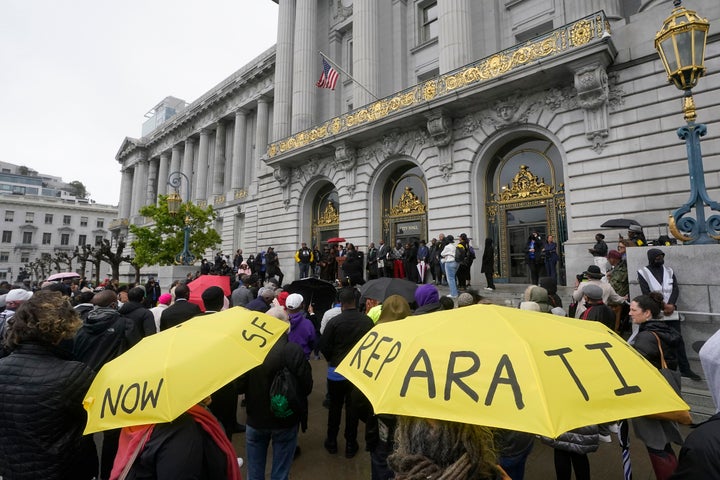 A crowd listens to speakers at a reparations rally outside of City Hall in San Francisco on Tuesday.