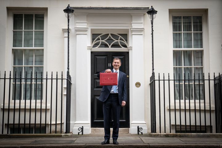 Chancellor of the Exchequer Jeremy Hunt leaves 11 Downing Street, London, with his ministerial box before delivering his Budget 