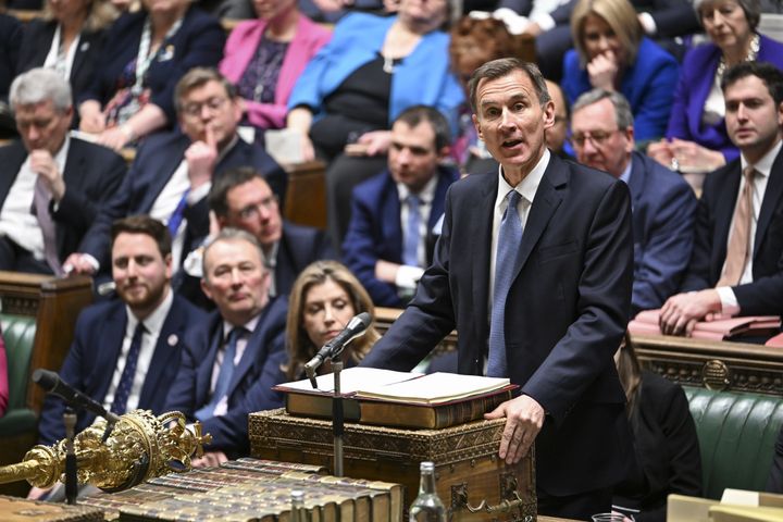Chancellor of the Exchequer Jeremy Hunt delivering his Budget to the House of Commons in London.