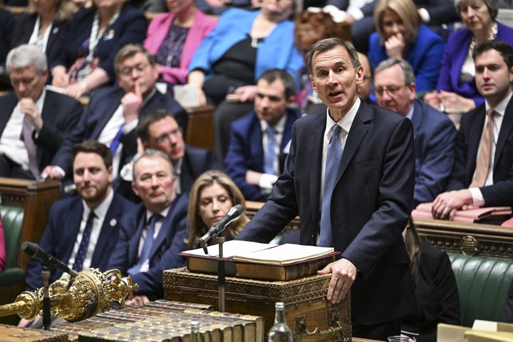 Chancellor of the Exchequer Jeremy Hunt delivering his Budget to the House of Commons in London.