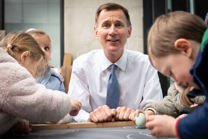 Chancellor of the Exchequer Jeremy Hunt, meeting children during a visit to Busy Bees Battersea Nursery in south London, after delivering his Budget earlier. Picture date: Wednesday March 15, 2023.