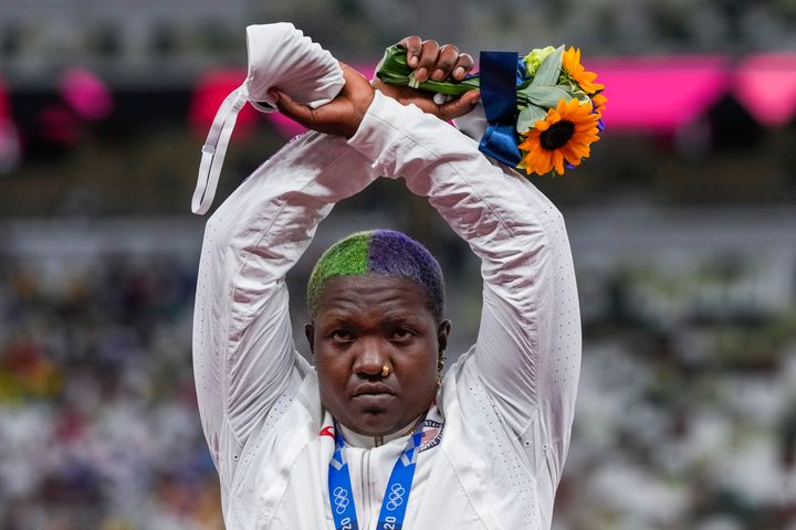 Raven Saunders, the silver-medal shot putter who used her platform at the Tokyo Olympics to bring attention to social injustice, has been suspended for 18 months for failing to show up for doping tests.