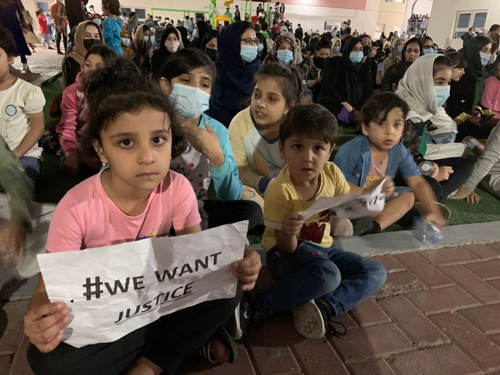 Afghans rallied in an Afghan refugee camp in Abu Dhabi, the capital of the United Arab Emirates, to protest the non-transfer to the U.S. on Feb. 13, 2022.