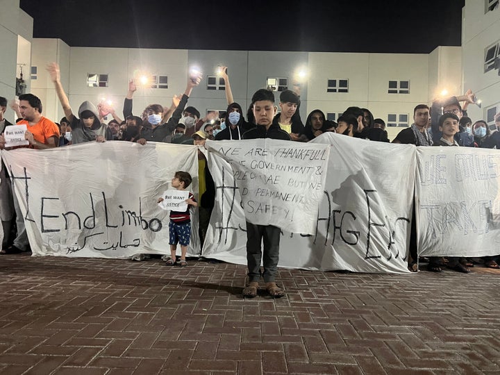 Afghans rally at an Afghan refugee camp in Abu Dhabi, capital of the United Arab Emirates, to protest against the non-transfer of refugees to the United States, February 13, 2022.