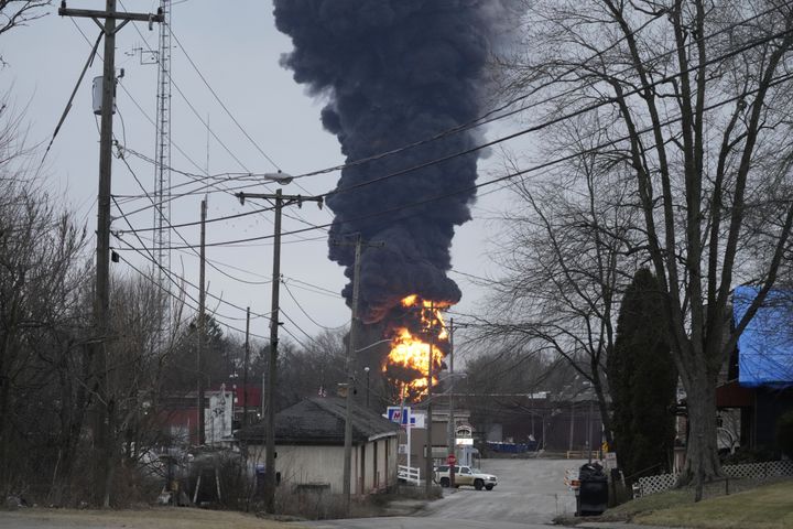 A black plume rises over East Palestine, Ohio, as a result of a controlled detonation of a portion of the derailed train on Feb. 6.