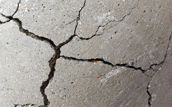 Detail of cracked concrete surface