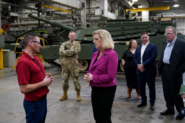 Army Secretary Christine Wormuth stands next to the latest version of the M1A2 Abrams main battle tank as she tours the Joint Systems Manufacturing Center, Thursday, Feb. 16, 2023, in Lima, Ohio. U.S. officials have said they plan to speed up the delivery of Abrams tanks to Ukraine by opting to send a refurbished, older model of the battle tank.