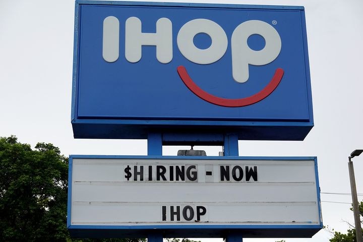 HALLANDALE, FLORIDA - SEPTEMBER 21: A Hiring Now sign near the entrance to an IHOP restaurant on September 21, 2021 in Hallandale, Florida. Government reports indicate that Initial jobless benefit claims rose 20,000 to 332,000 in the week ended Sept. 11. (Photo by Joe Raedle/Getty Images)