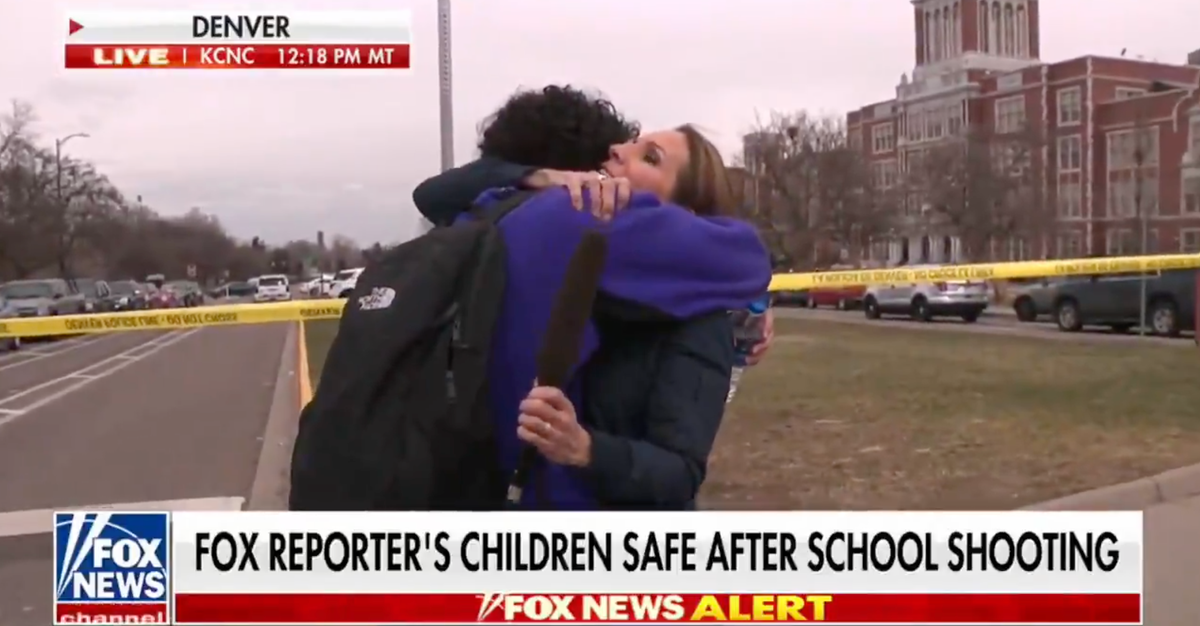 NextImg:Fox News Reporter Hugs Son Live On Air While Reporting On Shooting At His School