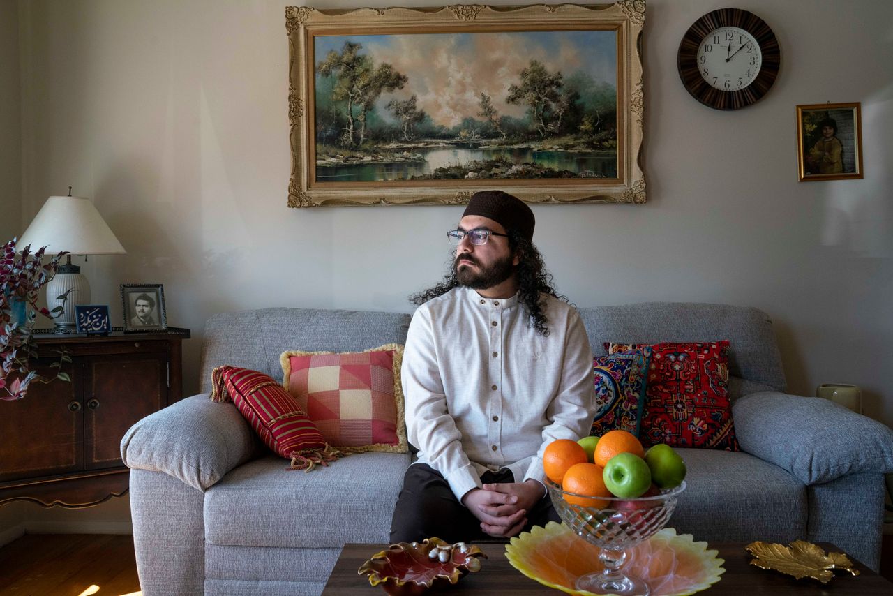 Muhammad Ali Mojaradi at his home in Troy, Michigan, on Sunday, March 19, 2023. Mojaradi teaches Persian Poetics online and has had accounts shut down at least a dozen times to receive payments from his students.