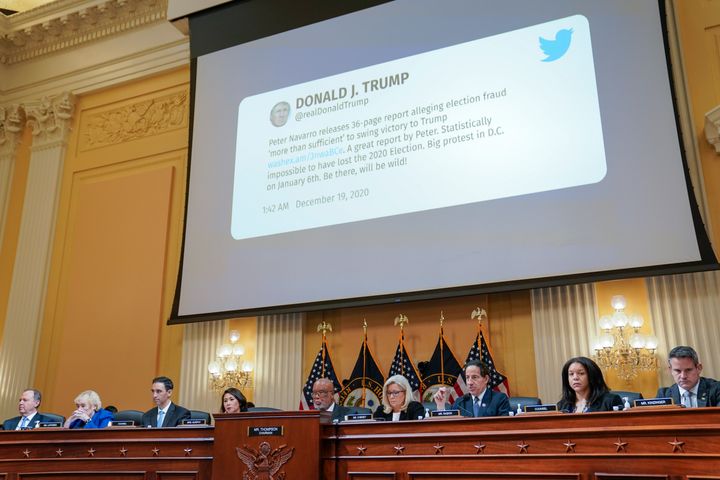 A Twitter message from Donald Trump encouraging people to come to the capital to protest on Jan. 6, 2021, is shown on a screen as the House select committee holds a July 2022 hearing on the attack on the U.S. Capitol.