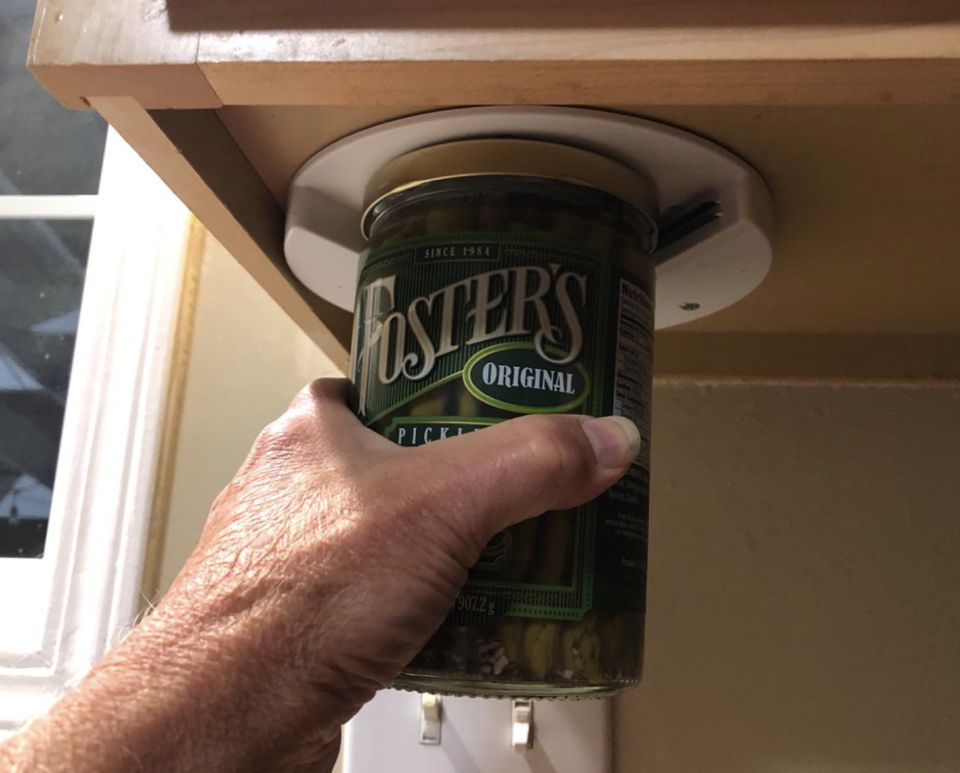 An under the cabinet jar opener